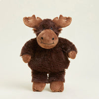 Plush moose toy on a beige background