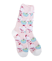 light pink socks with multiple white chickens with red outline and blue bowls with yellow soup inside and a spoon handle sticking out. The bowls have the word soup written on them