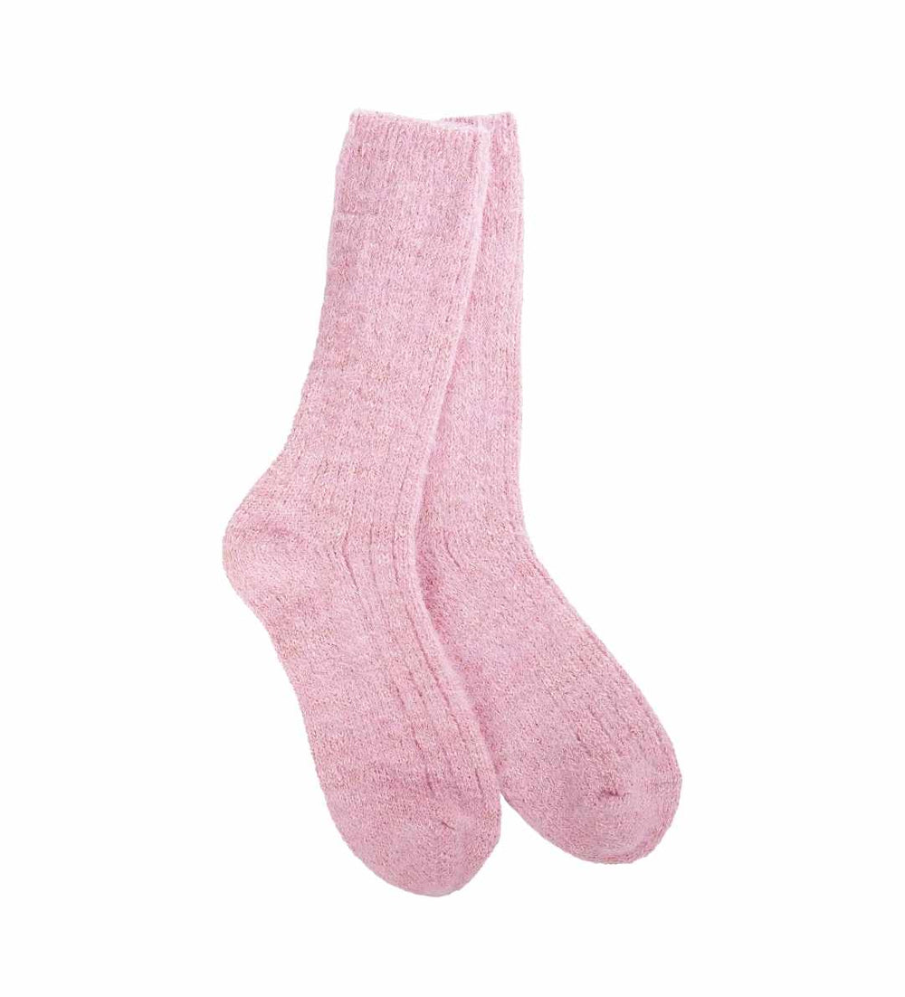 A pair of pink crew socks with a textured surface.