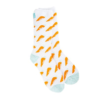 A pair of cozy crew socks with a pattern of carrots on a white background.